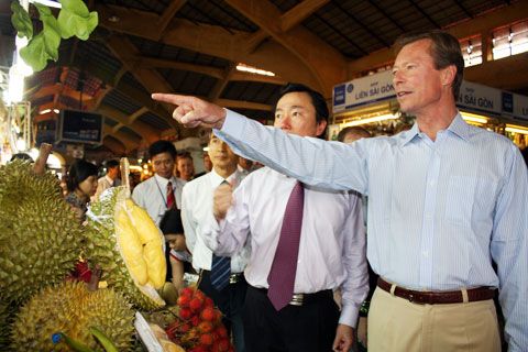 Grand Duke of Luxembourg Henri visits Ben Thanh Market